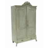 A painted pine wardrobe, with two arched doors and two drawers below,