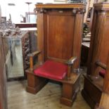 A mahogany Masonic Lodge chair, being for one of the three officers of the lodge, with panel back,