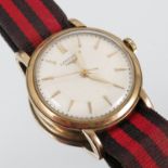 A gentleman's Longines 9 carat gold wrist watch