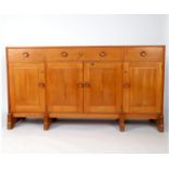 A Cotswold school sideboard,