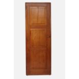 A wardrobe, with triple fielded panel door, width 24ins, height 73.25ins, depth 21.