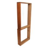 A wardrobe unit break front plinth base, width 57.5ins, max depth 22.