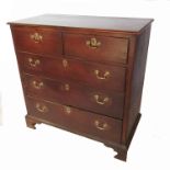 An antique oak chest of drawers, of two short drawers over three graduated long drawers, width 40.