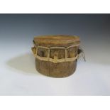 A Borneo Drum purchased in 1964 from the Iban longhouse Rumah Ansi on the Rajang river and a water