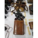 Pair of French WWI 8X Binoculars by Helles Paris in case and another X31 unmarked pair