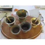 Five Nineteenth Century Brass Mortars and two pestles