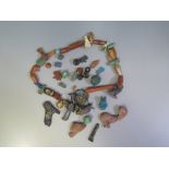 An Ancient Egyptian Necklace comprised of faience, stone, glass and metal ornaments. From a