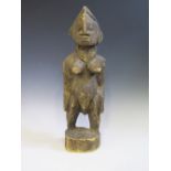 An Ivory Coast Bunyali Carved Softwood Figure possibly soil crop fertility, 40 cm. Bought 1960's