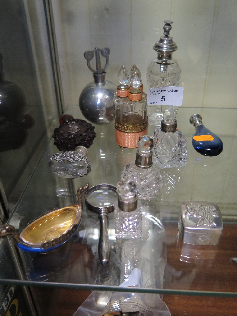Silver collared cut glass and other scent bottles, Norwegian salt and patch box