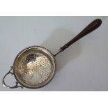 An Elizabeth II Silver Lemon Strainer, Birmingham 1957