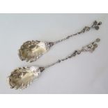 A Pair of Continental .800 (Fleur de Lis mark) Silver Serving Spoons, 195 g, largest 30.5 cm