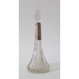 A Silver Collared Cut Glass Bottle, marks rubbed, 22.5 cm