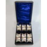 A George V Silver Cased Set of Six Napkin Rings, Birmingham 1921, Samuel M. Levi, 51 g