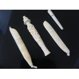 Two Antique Carved Ivory Needle Cases in the form of bean pods, one Chinese carved ivory needle case