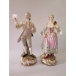 A Large Pair of Continental Porcelain Figures of a lady and gent with music script, 36 cm, crossed