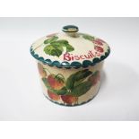 A Wemyss Biscuit Jar decorated with strawberries, painted mark to base WEMYSS T.Goode & Co. and