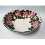 A Wemyss Dog Rose Wash Bowl, with impressed and painted mark to base and T. Goode & Co.