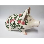 A Large Bristol Pottery Wemyss Style Pig with decorated with clover, c. 44 cm