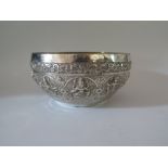 An Indian Silver Bowl with repoussé decoration of Hindu gods, 328 g, 20 cm diam.