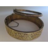 A Silver Gilt Hinged Bangle and one other