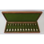 A Set of Twelve Elizabeth II Royal Horticultural Society Silver Flower Spoons in presentation