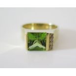 A 14K Gold, Peridot and Diamond Ring, size O, 7.4 g