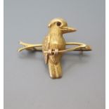 A 9ct Gold Kookaburra Brooch with garnet eye, c. 27 mm, 2.3 g