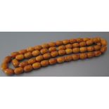 A Pressed Amber Bead Necklace, 49.3 g gross