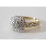 An 18ct Gold and Diamond Cluster Ring, 0.82 ct, size L, 3.4 g