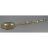 A Silver Mounted Horn Spoon with a Scottish thistle silver finial, 21 cm