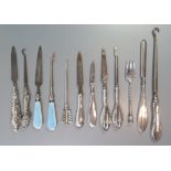 A Collection of Silver Handled and Plated Manicure Tools