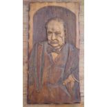 A Carved Elm Plaque of Sir Winston Churchill by G. Self, 112 x 60 cm