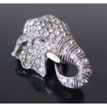 A Costume Jewellery Brooch in the form of an elephant's head in a white metal setting, marked to the