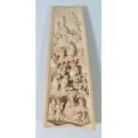 A Nineteenth Chinese Ivory Wrist Rest carved with figures in a landscape, 15.5 cm. Slight chip to