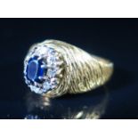 An 18ct Gold, Sapphire and Diamond Ring, size M.5, 5.4 g