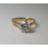 A Good .750 Gold and Diamond Solitaire Engagement Ring, size L.5, 3.6 g with accompanying Goldsmiths