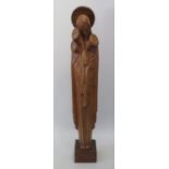 A Carved Wooden Sculpture depicting Mary, dated 1933, 72 cm