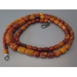 An Amber Bead Necklace, 24.8 g gross