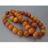 An Amber Bead Necklace, 103.4 g gross