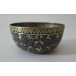 A Burmese Silver Gilt and Niello Bowl, 36 g, 7 cm diam.