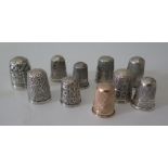 A 9ct Gold Thimble (3.4g) and silver and white metal thimbles