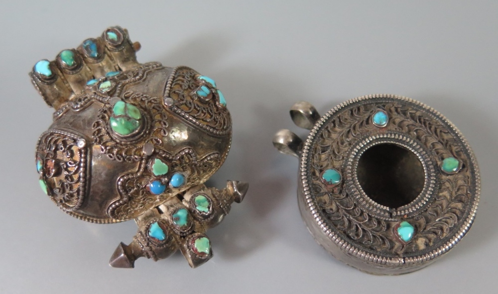 Two Antique Tibetan Silver and Turquoise Set Prayer Pendants