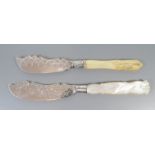 Two Victorian Silver Butter Knives, one with mother of pearl handle and the other ivory,