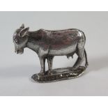 An Indian Silver Model of a Sacred Cow, c. 6 cm long