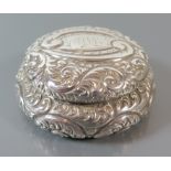 A Sterling Silver foliate decorated pill pot, 5.5 cm diam.