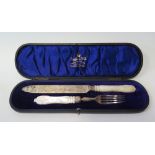 An Edward VII Cased Silver and Mother of Pearl Handled Bread Knife and Fork, Sheffield 1908,