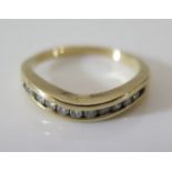 An 18ct Gold and Diamond Half Eternity Ring, size M, 2.6 g