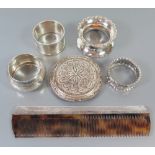 Four Silver Napkin Rings, silver filigree compact and silver mounted comb, 51 g weighable silver