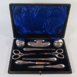 A George V Silver Mounted Nine Piece Cased Manicure Set, Birmingham 1913, HM