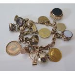 A 9ct Gold Charm Bracelet with 9ct gold bloodstone mounted swivel fob, Georgian seals, George III